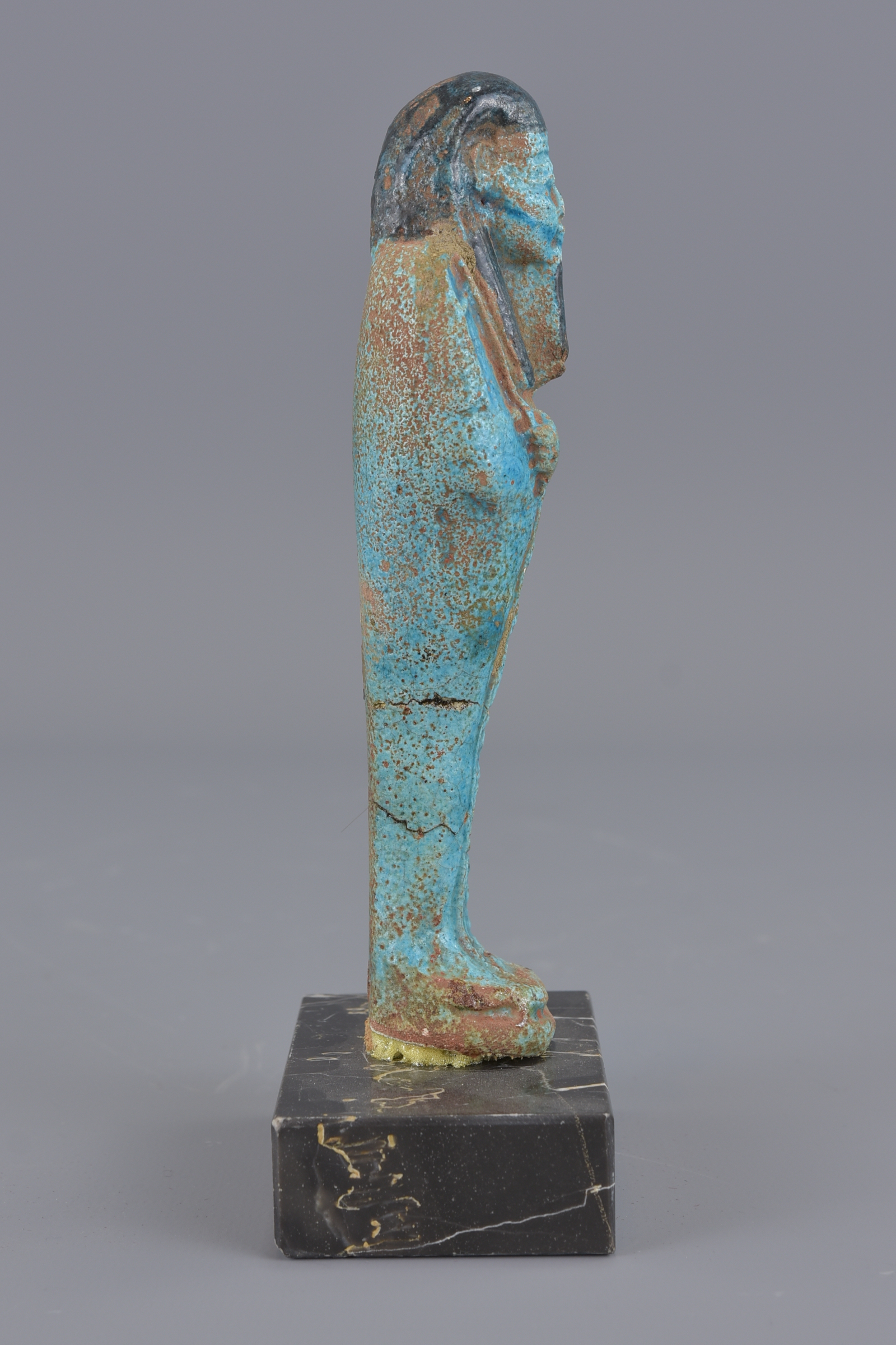 An Egyptian blue faience figure on marble stand. 1 - Image 4 of 4