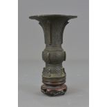 A Chinese Ming dynasty "Gu" shape bronze beaker wi