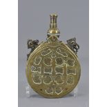 An Eastern 19th century bronze powder flask. 17cm