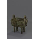 A Chinese archaic style bronze Ding censer. 13 x 1