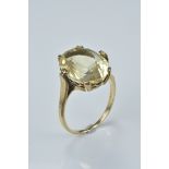 Gold ring with large citron stone. Size S