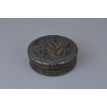 A 19th century Chinese carved tortoise shell ink b