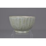 A Chinese/Japanese celadon fluted porcelain bowl w