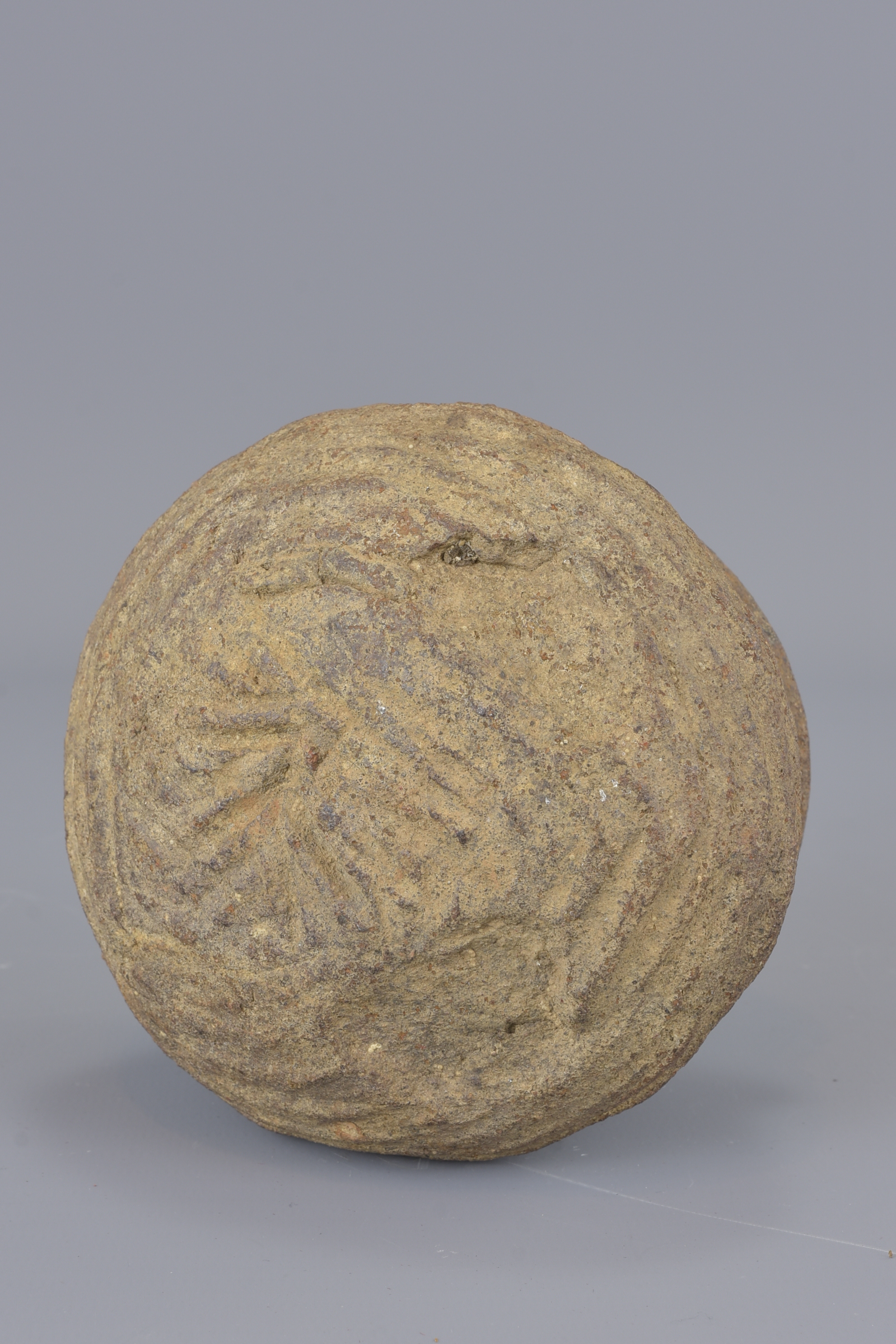 A stoneware Neolithic pot. 8cm tall - Image 4 of 5