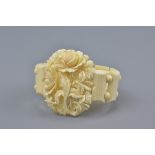 A Victorian Ivory bracelet carved with floral design