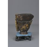 A Chinese carved bamboo libation cup with later st