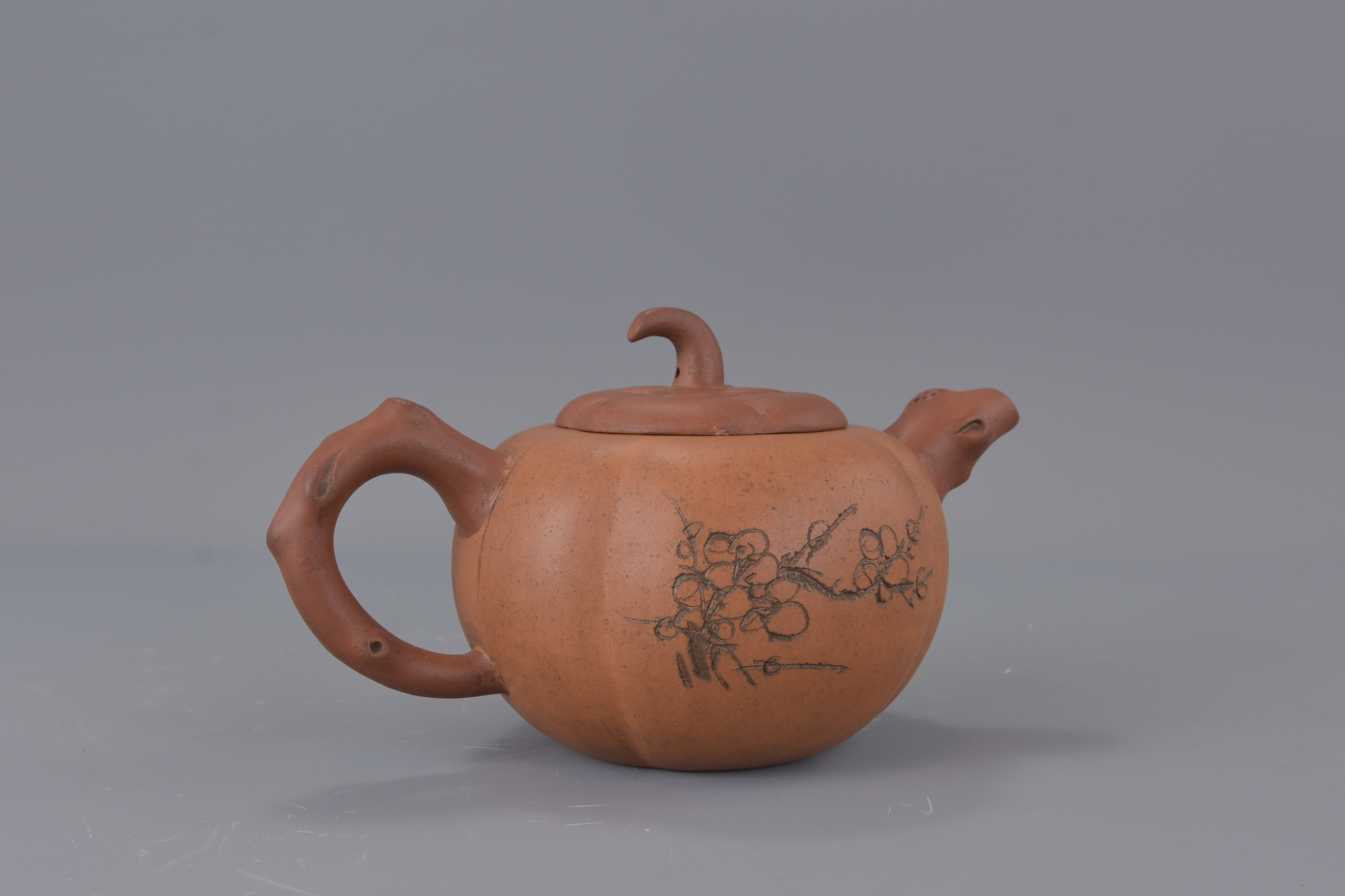 A 20th Century Chinese Yixing Teapot in the form of a pumpkin. Inscription and makers mark to base. - Image 2 of 4