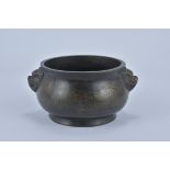 A 19th Century Chinese Bronze Censer with twin lion masks, dragon design to base. Six character mark