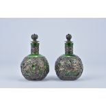 A Pair of 19/20th century Chinese export green Glass perfume scent Bottles with Silver dragon and fl