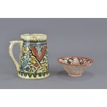 A Turkish 19th Century Ceramic Tankard together with a small Islamic Bowl. 13cm height, 11cm x 8cm