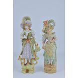 A Pair of antique Porcelain Ladies Figures 34.5cm, 32.8cm (2)