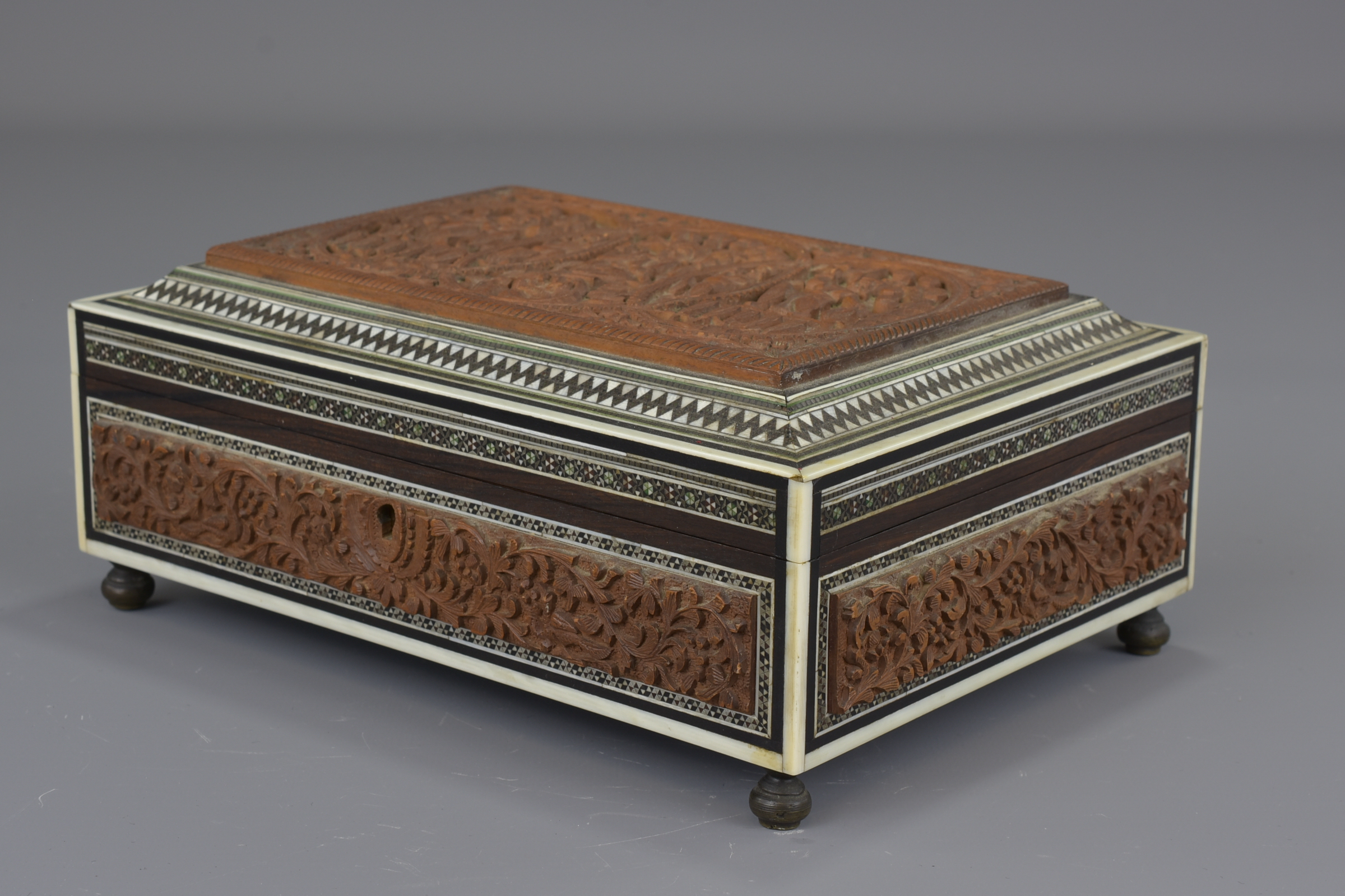 An Indian 19th century sandalwood box inlaid with bone and ebony. 22 cm length. - Image 4 of 8