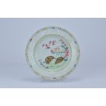 An 18th Century Chinese export Famillie Rose porcelain dish painted with two quails amongst flowers.