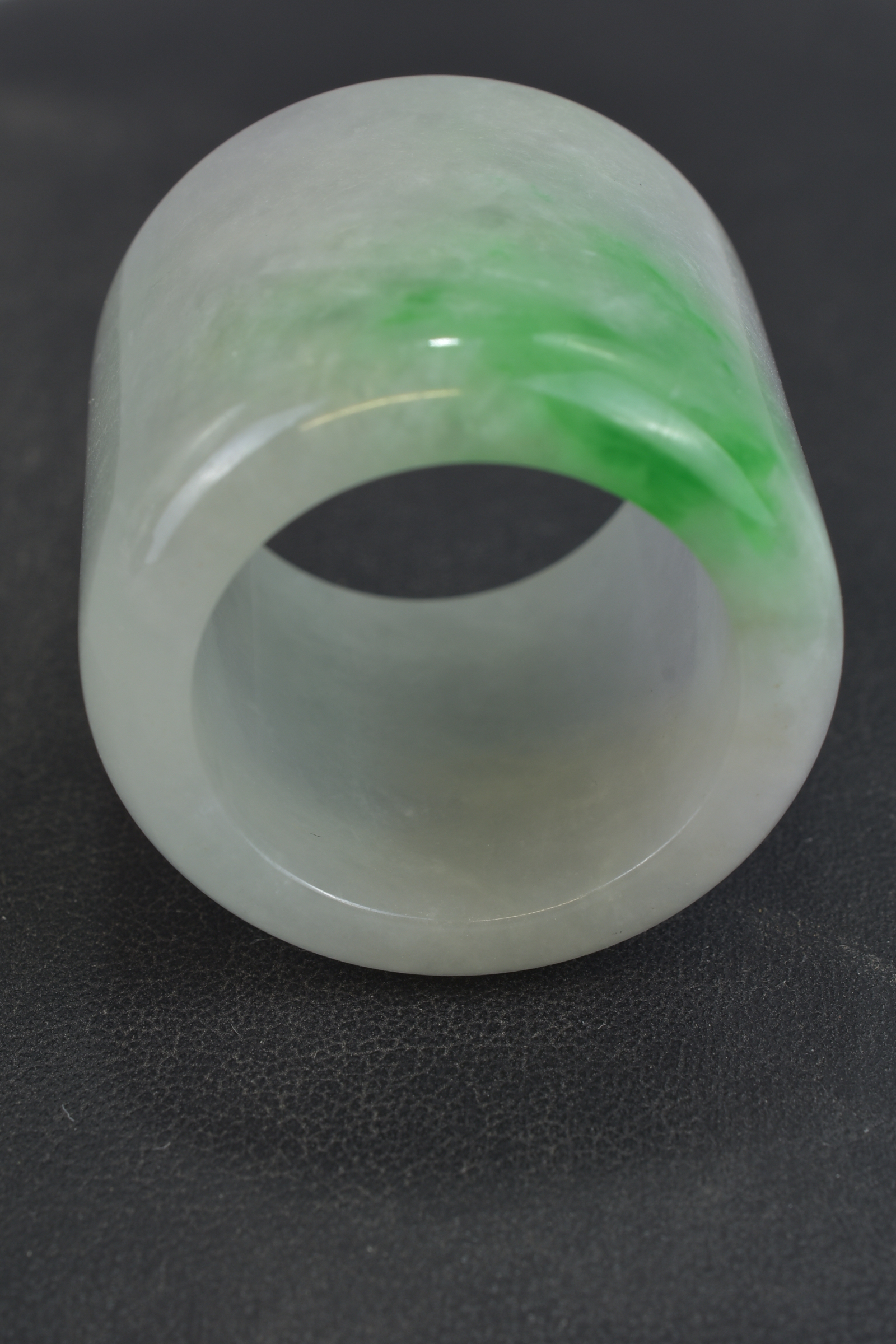 A Chinese jadeite archers ring. 3cm x 3.2cm - Image 5 of 6