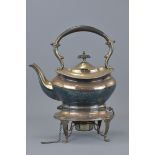 A Victorian silver plated Trivet kettle with burner. 31cm height