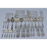 A group of silver and stainless steel Knifes, forks and serving spoons. WMF patent 90 INOX. Total 52