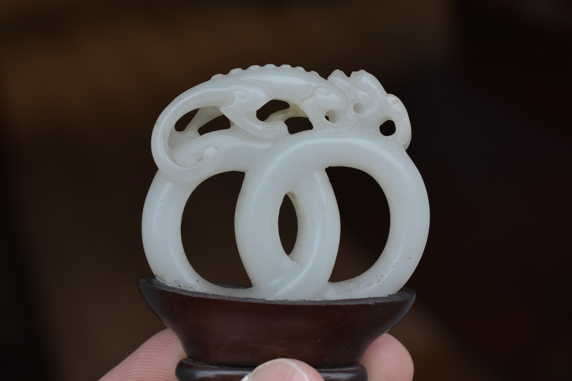 A 19th century Chinese carved White Jade joined rings surmounted by a dragon attached to wooden stan - Image 13 of 13