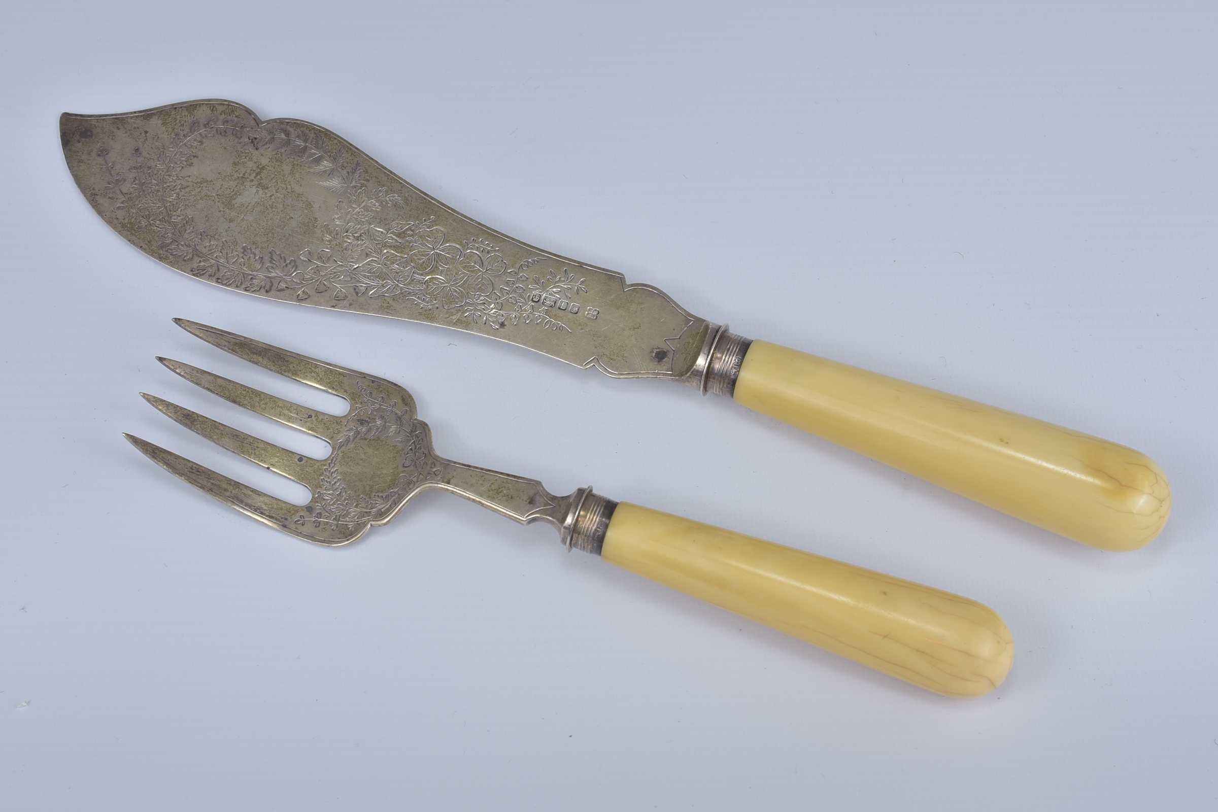 A Pair of Silver and Ivory Fish Servers. 23.5cm, 31cm (2)