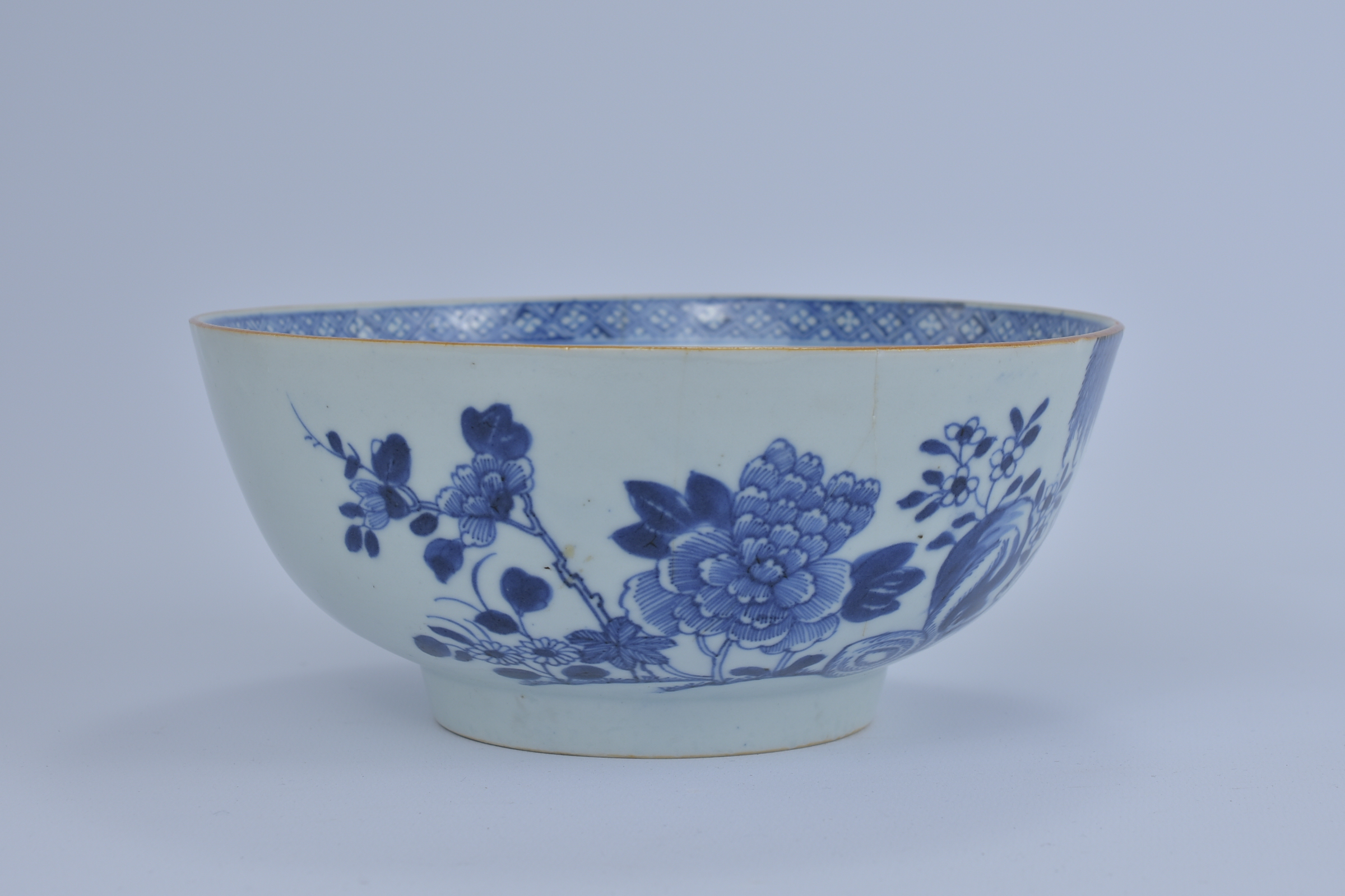 An 18th Century Chinese Blue and White export porcelain Bowl with garden and floral design. Kangxi p - Image 2 of 5