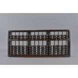 A 19/20th Century Chinese hardwood Abacus 18.5cm x 42.5cm