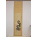 A Chinese watercolour painting in scroll of dragonfly and flower pot. Signed Qi Baishi. Painting 131