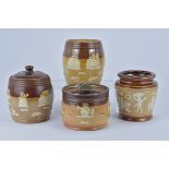 Four Royal Doulton stoneware Tobacco Jars. (two without covers) 10.8cm tall, 12.5cm tall, 12.8cm tal