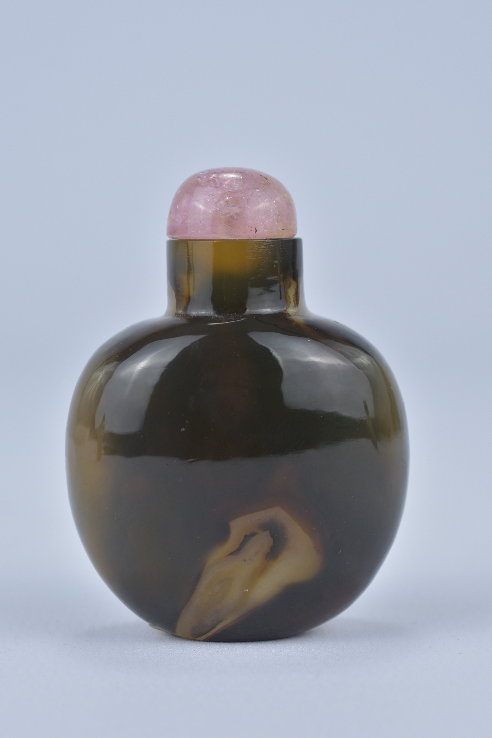 A Chinese yellow and brown Agate Snuff Bottle with pink quartz Stopper. 5cm tall. Purchased between - Image 2 of 3