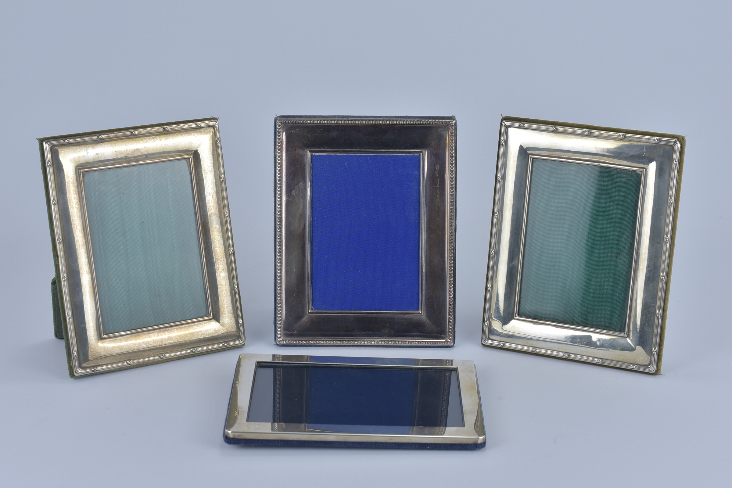 Four Silver metal picture Frames 18cm x 14cm (x3), 18cm x 12.8cm (4)