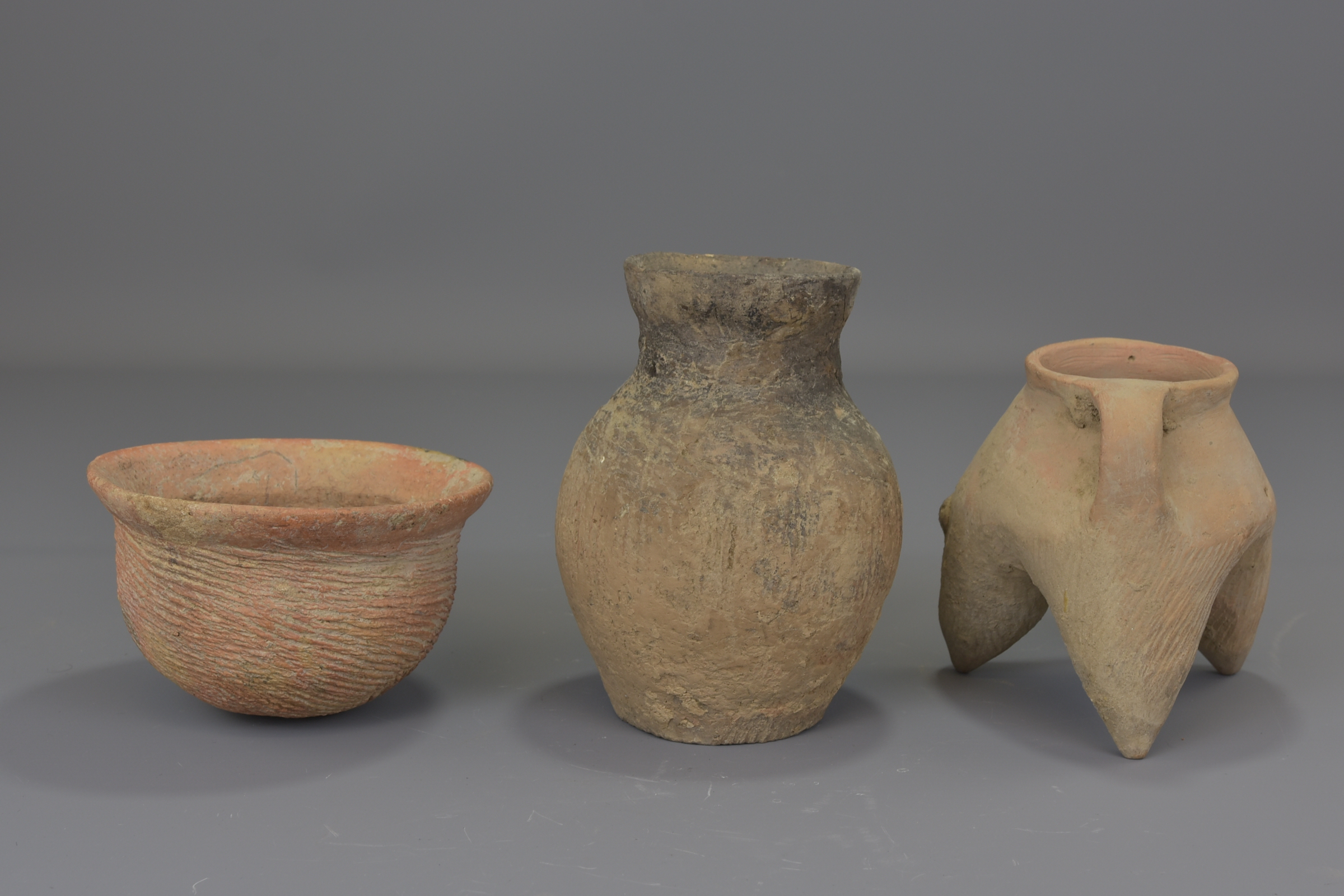 Three Chinese Neolithic period pottery pots and bowl. 12cm - 14cm tall. Provenance: From a private c - Image 2 of 5