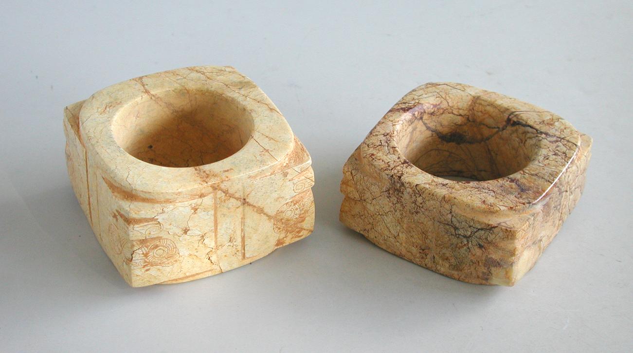 Two Chinese Neolithic or Later Stone / Jade Cong. Two mottled hardstone cong, possibly jade, each wi