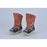 A nice Pair of Chinese 20th century red and blue Embroidered Children boots with floral and butterfl