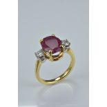 18ct gold, ruby and diamond ring. Size O