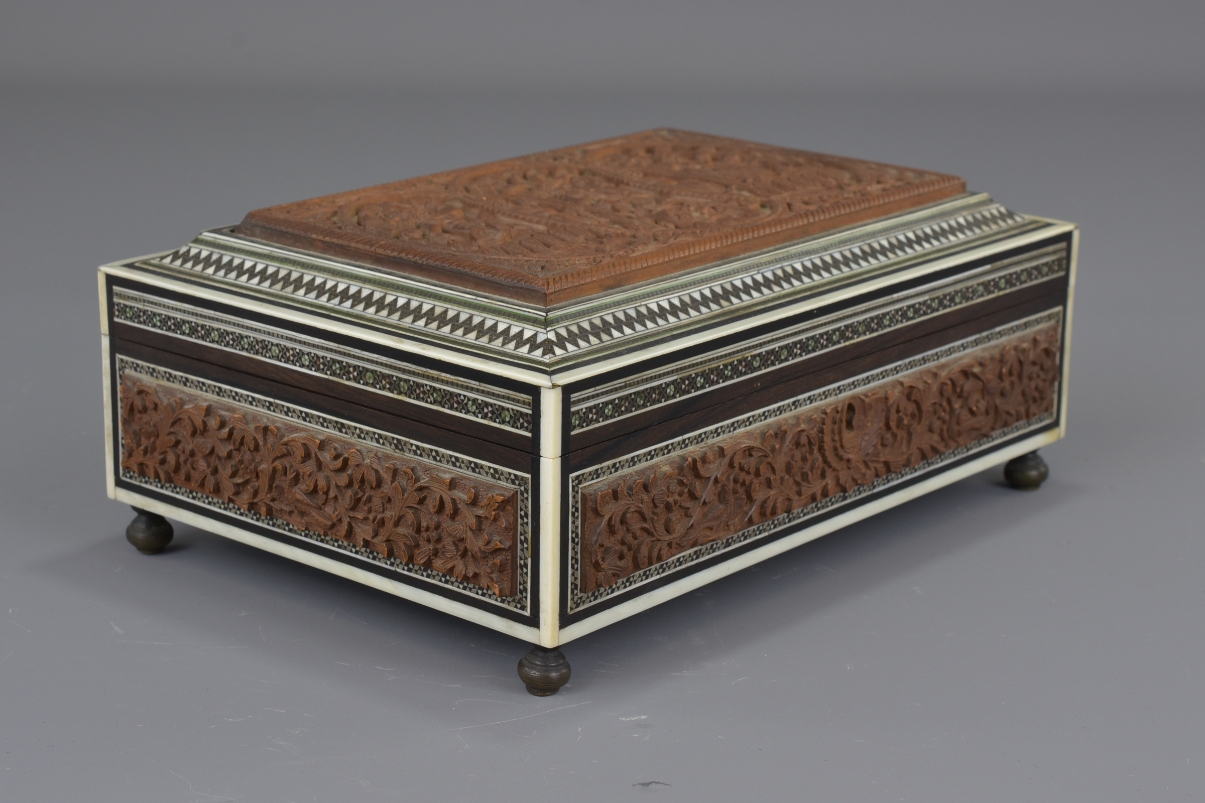 An Indian 19th century sandalwood box inlaid with bone and ebony. 22 cm length. - Image 3 of 8