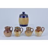 Four Royal Doulton Lamberth stoneware Jugs and Royal Doulton Tobacco Jar and cover. 8.9cm tall, 8.9c