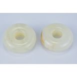 Two White Jade Rings. 4.6cm diameter (2)