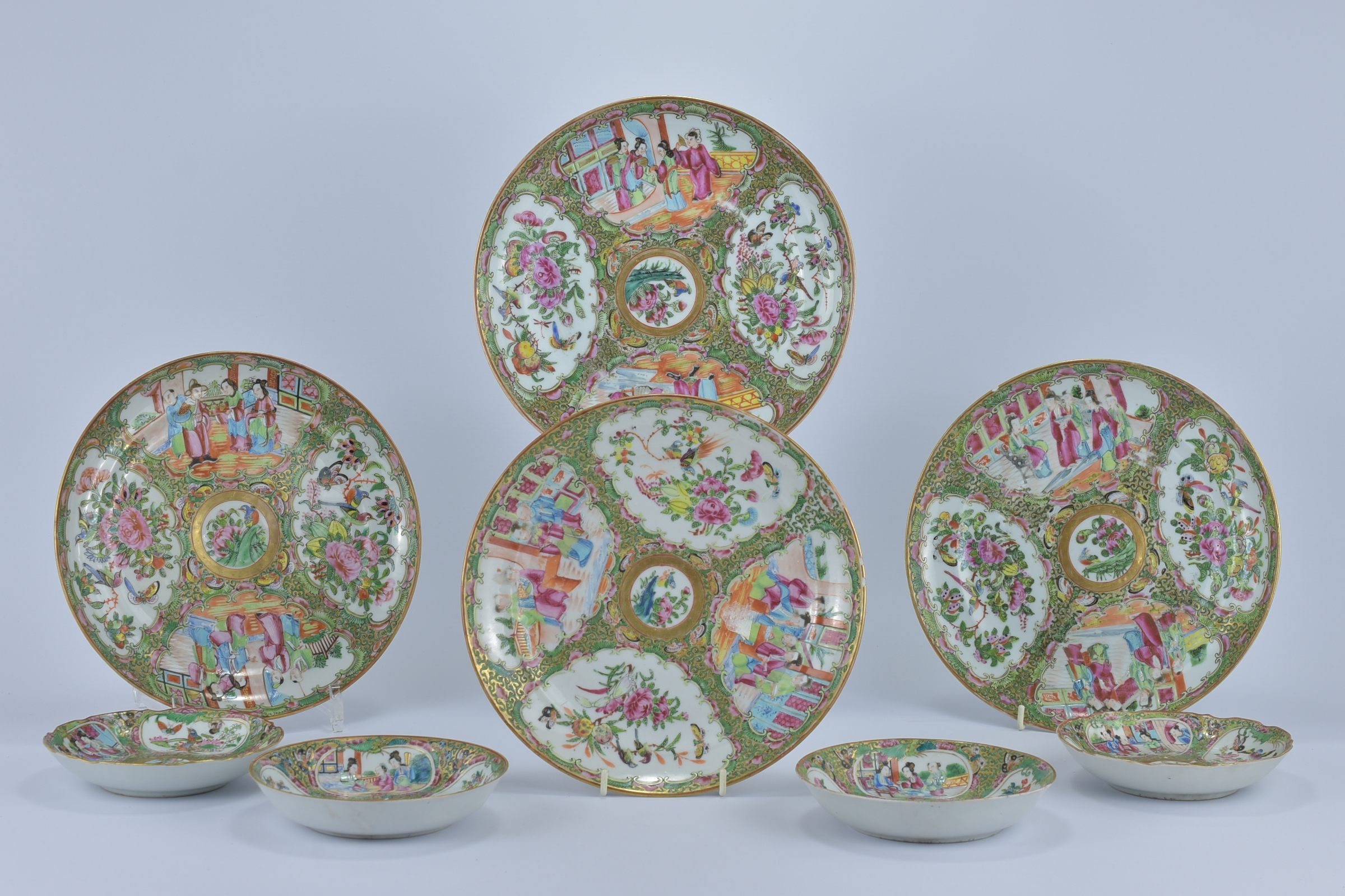 A group of 19th Century Cantonese famille rose Plates together with Four Smaller dishes. 25cm diamet