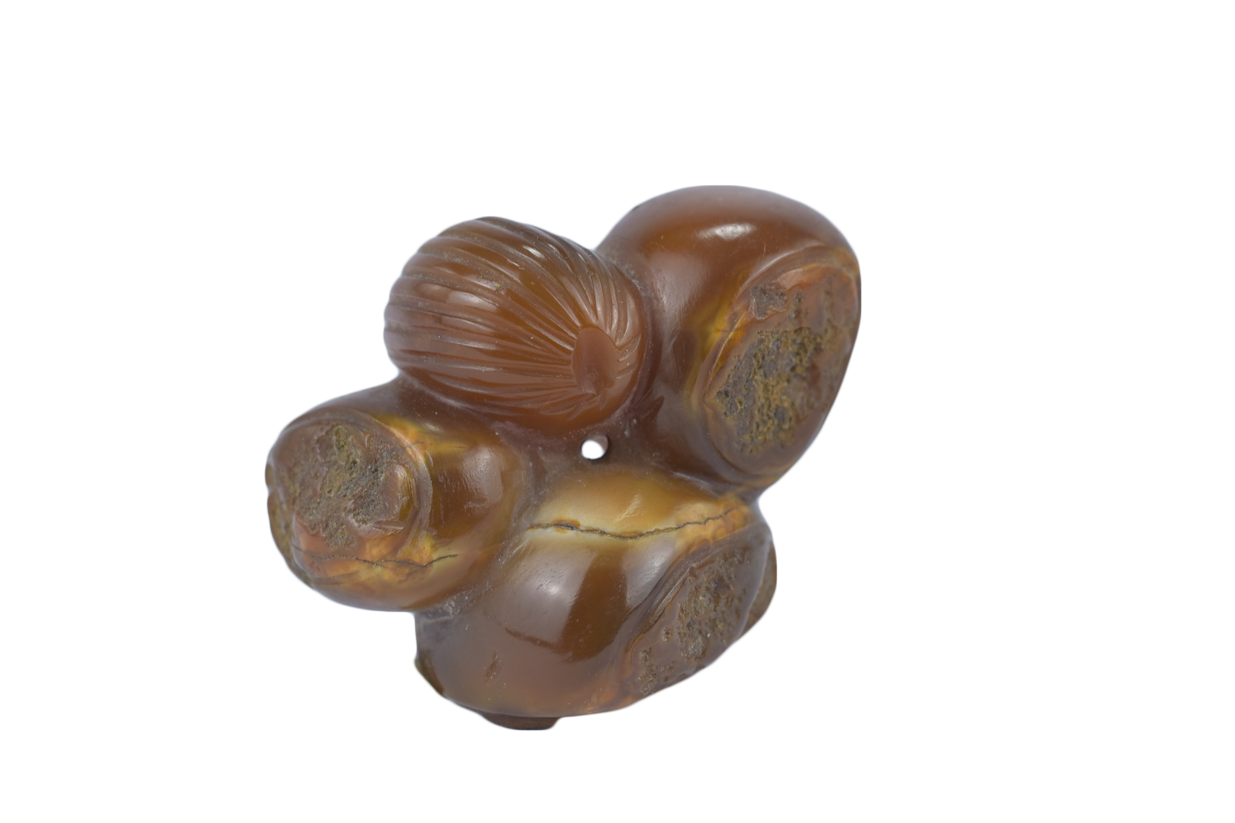 A Chinese 19th century Agate Pendant carved as a cluster of nuts. 3.5cm x 3cm. Purchased between 197