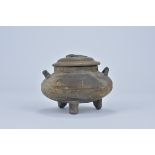 A Chinese Han Dynasty twin handled Grey pottery tripod pot with fish design cover. 8.9cm tall Proven