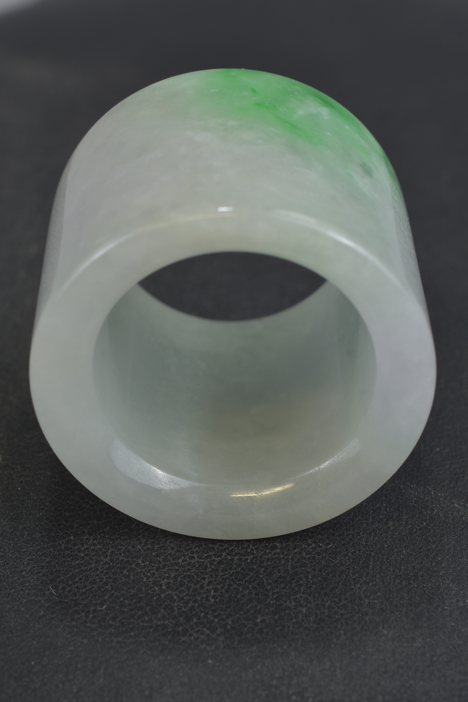 A Chinese jadeite archers ring. 3cm x 3.2cm - Image 6 of 6