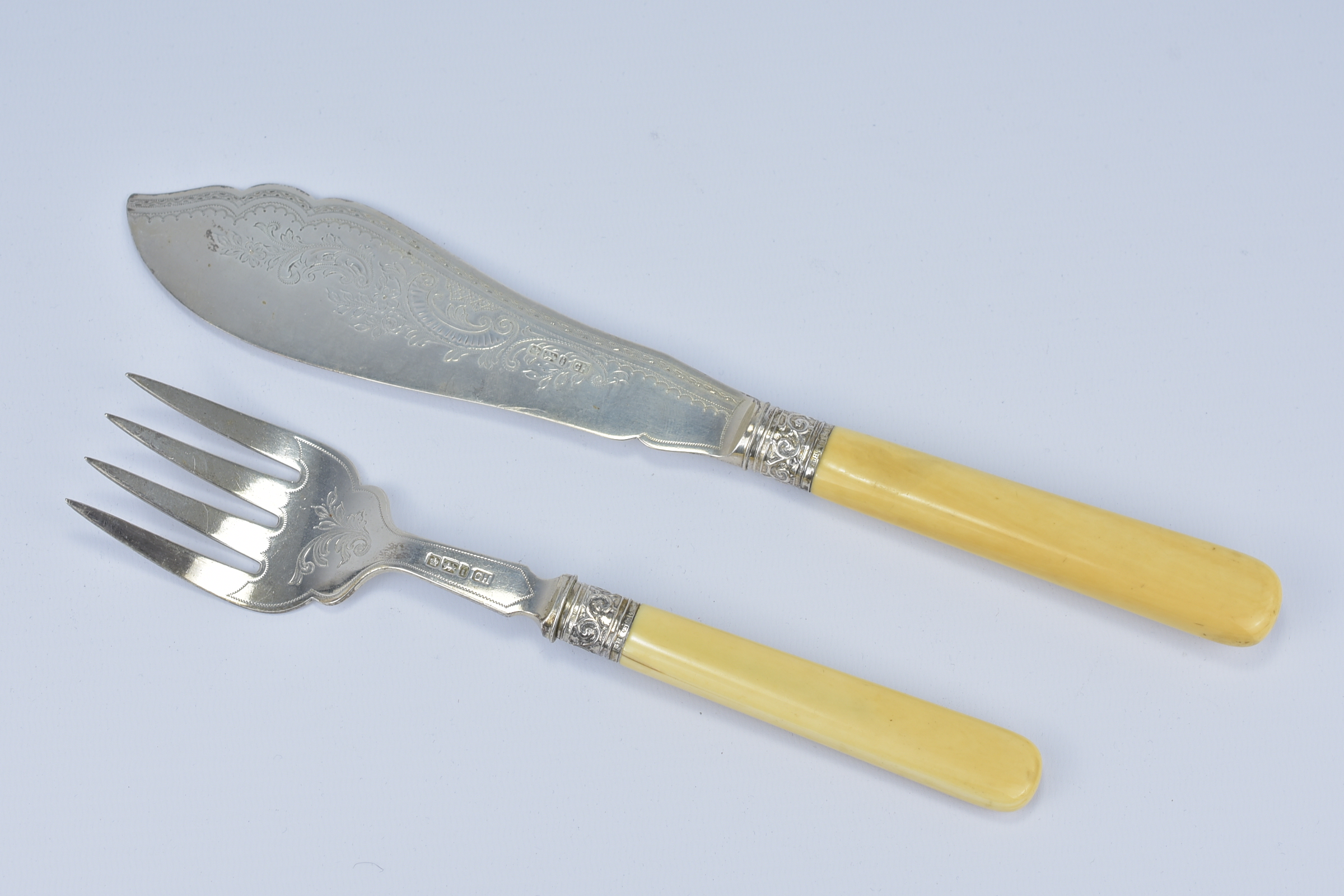 A Pair of Silver and Ivory Fish Servers. 23.5cm, 31cm (2)