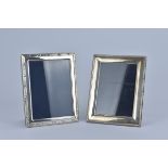 Two Sterling Silver picture Frame. One with 'Harrods' logo. 22.3cm x 17.5cm (2)