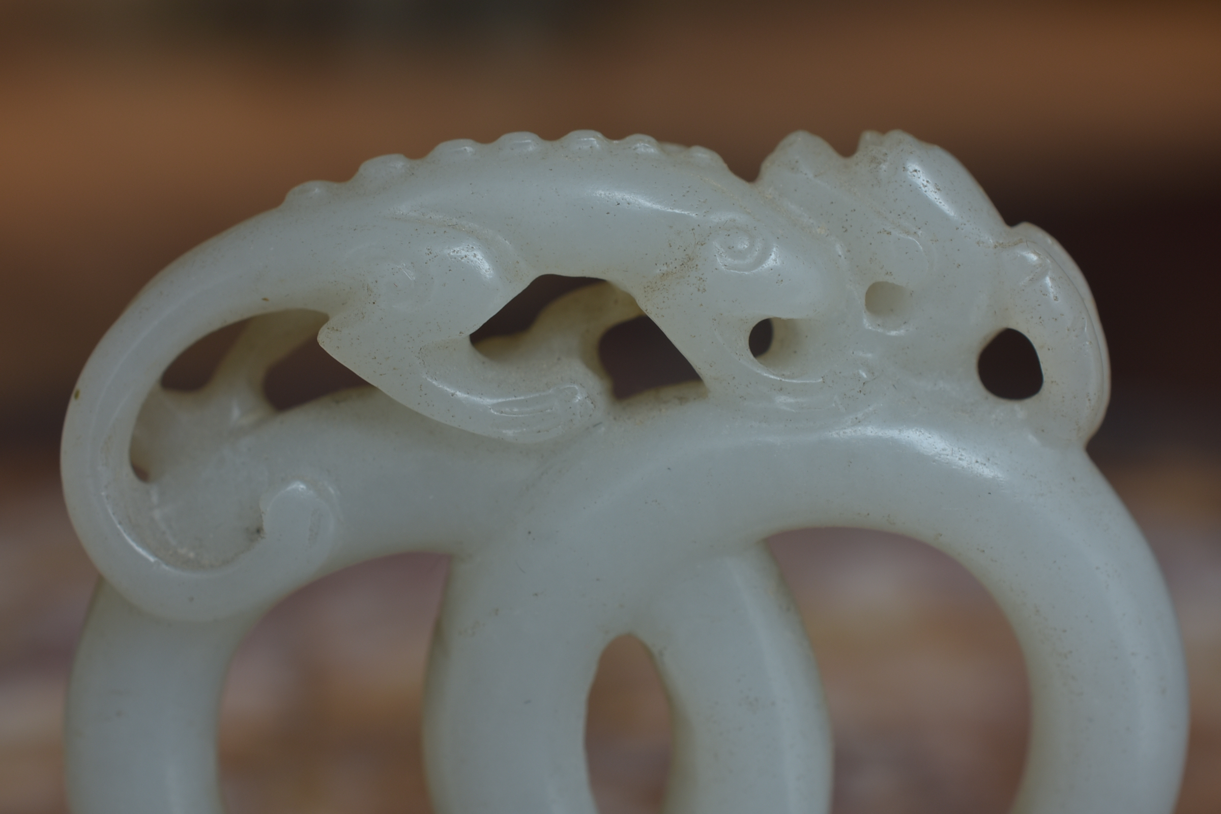 A 19th century Chinese carved White Jade joined rings surmounted by a dragon attached to wooden stan - Image 10 of 13