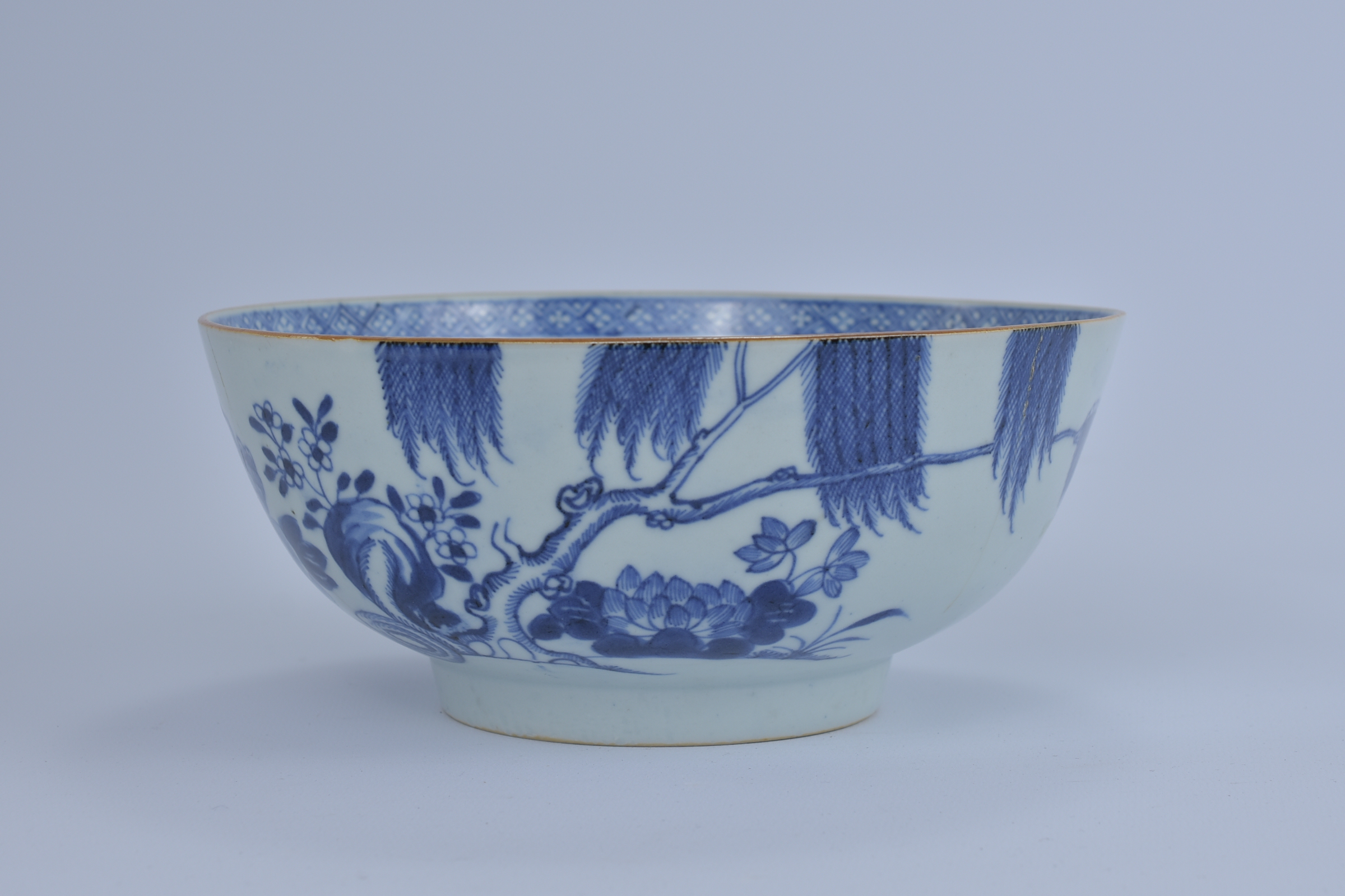 An 18th Century Chinese Blue and White export porcelain Bowl with garden and floral design. Kangxi p - Image 3 of 5