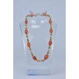 A Gold and carnelian beaded Necklace (tested gold)