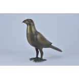 A 19th century Indo - Persian Bronze Figure of a bird. 31cm tall