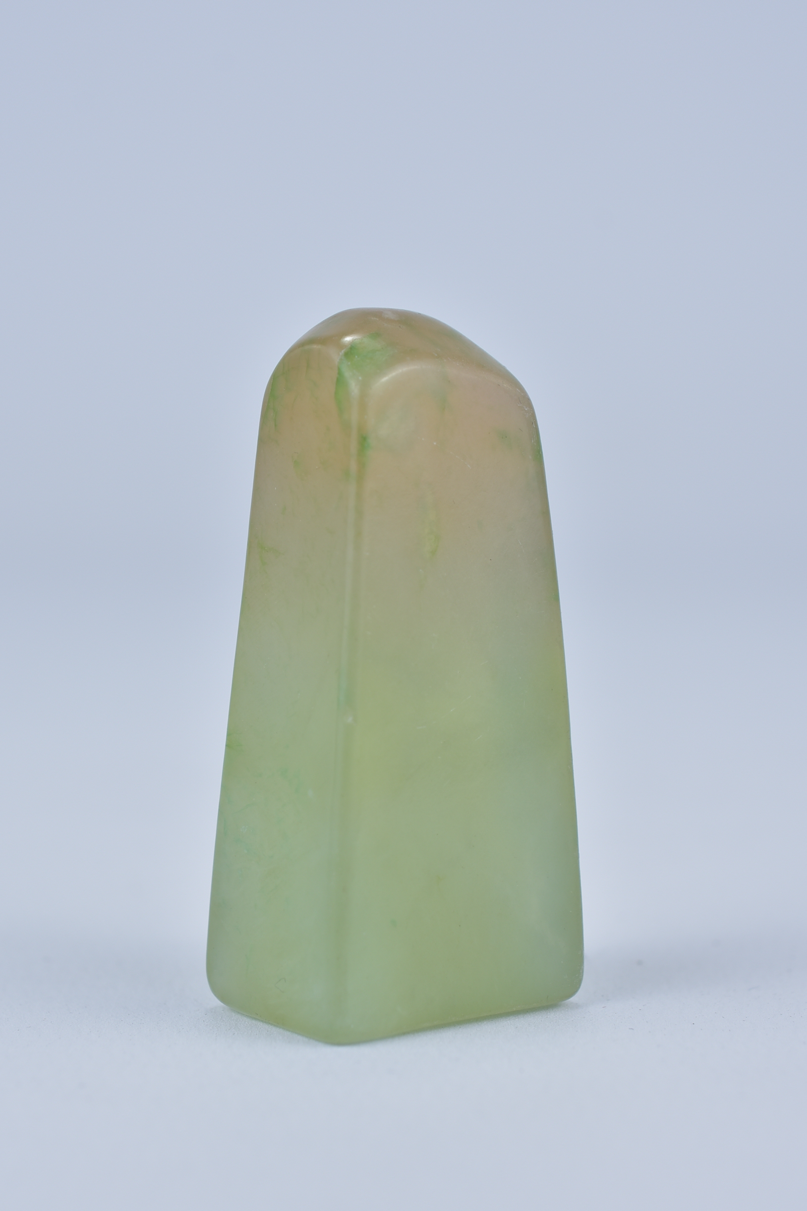 A Chinese pale green and yellow Jadeite Seal uncarved. 4.8cm x 2cm