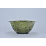 A large 20th century Chinese bowenite serpentine pale and dark green bowl. 22cm diameter x 10cm tall