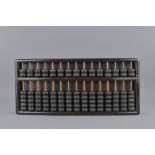 A 19/20th Century Chinese hardwood Abacus 18.5cm x 41cm