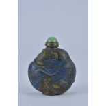 A Chinese Blue Stone Snuff Bottle with Green stone stopper. 6cm