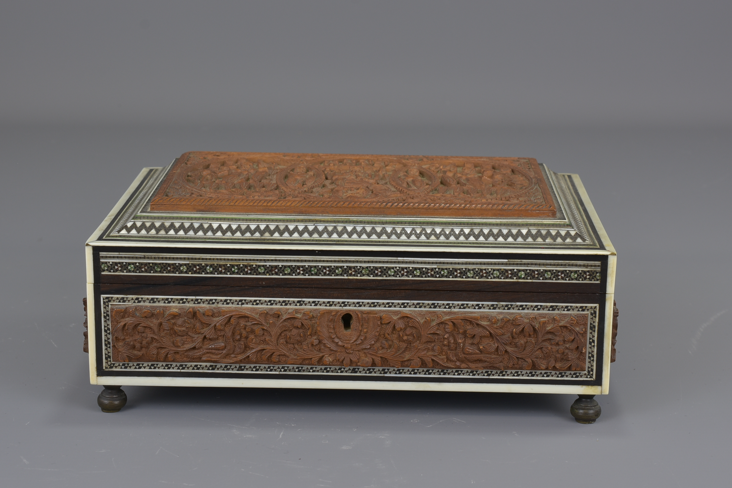 An Indian 19th century sandalwood box inlaid with bone and ebony. 22 cm length. - Image 2 of 8
